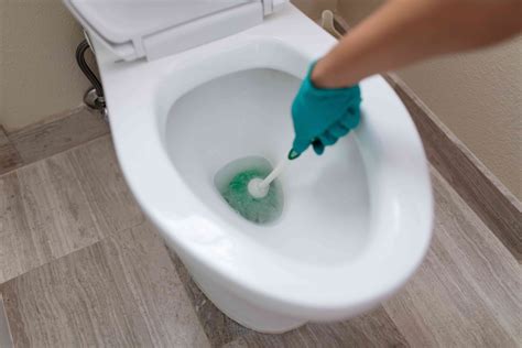Toilet brush with magic eraser pad